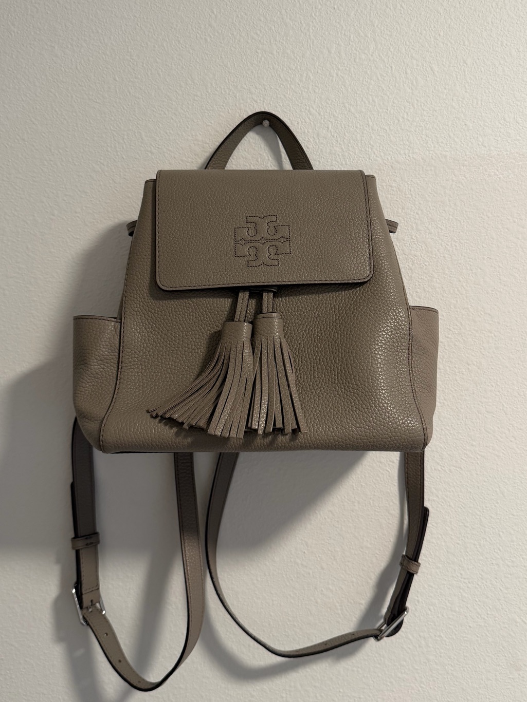Tory Burch Taupe Pebbled Leather Tassel Backpack